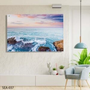 תמונה לסלון של גלי ים מתנפצים עלסלעים בשקיעה צבעונית